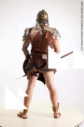 Casual Fighting with sword Man White Sitting poses - simple Muscular Short Brown Sitting poses - ALL Standard Photoshoot Academic Fighting poses - ALL