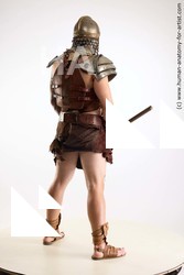 Casual Fighting with sword Man White Sitting poses - simple Muscular Short Brown Sitting poses - ALL Standard Photoshoot Academic Fighting poses - ALL