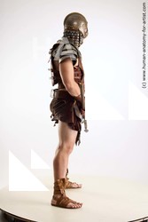 Casual Fighting with sword Man White Sitting poses - simple Muscular Short Brown Sitting poses - ALL Standard Photoshoot Academic Fighting poses - ALL