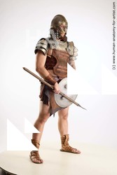 Casual Fighting with sword Man White Sitting poses - simple Muscular Short Brown Sitting poses - ALL Standard Photoshoot Academic Fighting poses - ALL