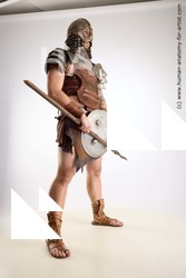 Casual Fighting with sword Man White Sitting poses - simple Muscular Short Brown Sitting poses - ALL Standard Photoshoot Academic Fighting poses - ALL