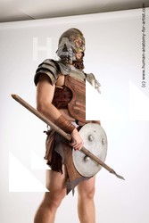 Casual Fighting with sword Man White Sitting poses - simple Muscular Short Brown Sitting poses - ALL Standard Photoshoot Academic Fighting poses - ALL