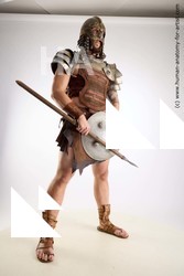 Casual Fighting with sword Man White Sitting poses - simple Muscular Short Brown Sitting poses - ALL Standard Photoshoot Academic Fighting poses - ALL