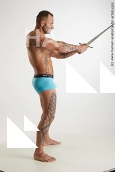 Underwear Fighting with sword Man White Standing poses - ALL Muscular Short Brown Standing poses - simple Standard Photoshoot Academic Fighting poses - ALL