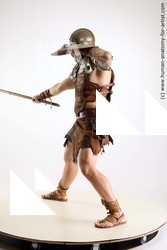 Casual Fighting with sword Man White Standing poses - ALL Muscular Short Brown Standing poses - simple Standard Photoshoot Academic Fighting poses - ALL
