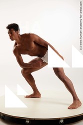 Swimsuit Man Black Standing poses - ALL Muscular Short Black Standing poses - simple Standard Photoshoot Academic