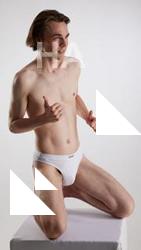 Kneeling reference poses Tony