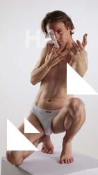 Kneeling reference poses Tony