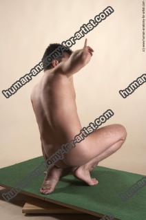 filip kneeling 70