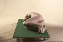 Nude Man White Laying poses - ALL Average Bald Grey Laying poses - on side Realistic