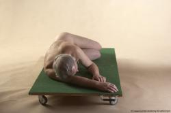 Nude Man White Laying poses - ALL Average Bald Grey Laying poses - on side Realistic