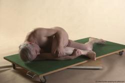 Nude Man White Laying poses - ALL Average Bald Grey Laying poses - on side Realistic