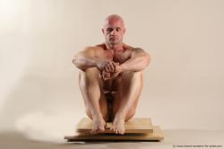 Bodybuilder Sitting