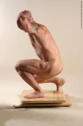 Nude Man White Standing poses - ALL Muscular Bald Standing poses - knee-bend Realistic