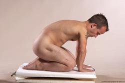 Michael Lilliputian Kneeling