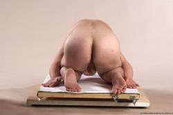 Michael Lilliputian Kneeling