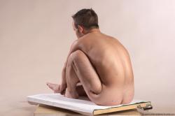 Michael Lilliputian Sitting