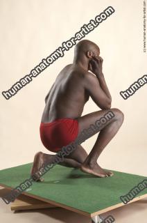 david kneeling 22