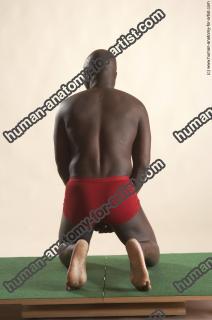 david kneeling 29