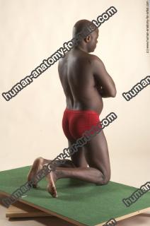 david kneeling 06