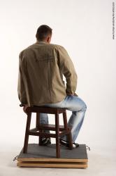 Casual Man White Sitting poses - simple Muscular Short Brown Sitting poses - ALL Academic