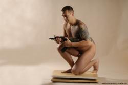 Nude Fighting with spear Man White Kneeling poses - ALL Average Short Brown Kneeling poses - on one knee Realistic