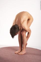 Nude Man White Standing poses - ALL Slim Short Brown Standing poses - bend over Realistic