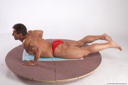 Swimsuit Man White Laying poses - ALL Muscular Short Brown Laying poses - on stomach Academic