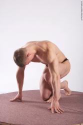 Swimsuit Man White Kneeling poses - ALL Muscular Short Brown Kneeling poses - on one knee Academic