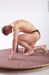 Swimsuit Man White Kneeling poses - ALL Muscular Short Brown Kneeling poses - on one knee Academic