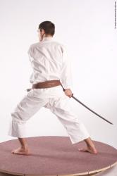 Sportswear Fighting with sword Man White Standing poses - ALL Athletic Short Brown Standing poses - simple Academic