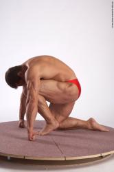 Swimsuit Man White Kneeling poses - ALL Muscular Short Brown Kneeling poses - on one knee Academic