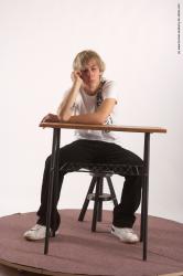 Casual Daily activities Man White Sitting poses - simple Slim Short Brown Sitting poses - ALL Academic