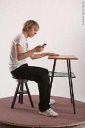 Casual Daily activities Man White Sitting poses - simple Slim Short Brown Sitting poses - ALL Academic