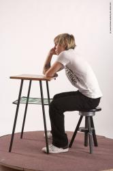 Casual Daily activities Man White Sitting poses - simple Slim Short Brown Sitting poses - ALL Academic