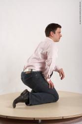 Casual Man White Kneeling poses - ALL Average Short Brown Kneeling poses - on one knee Academic