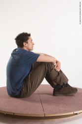 Casual Man White Sitting poses - simple Slim Short Brown Sitting poses - ALL Academic