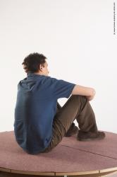 Casual Man White Sitting poses - simple Slim Short Brown Sitting poses - ALL Academic