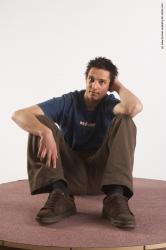 Casual Man White Sitting poses - simple Slim Short Brown Sitting poses - ALL Academic