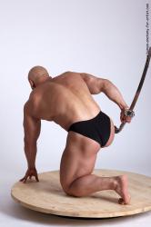 Swimsuit Fighting with sword Man White Kneeling poses - ALL Muscular Bald Kneeling poses - on one knee Academic