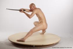 Nude Fighting with sword Man White Standing poses - ALL Slim Bald Standing poses - knee-bend Realistic