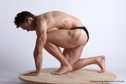 Swimsuit Man White Kneeling poses - ALL Muscular Short Brown Kneeling poses - on one knee Academic