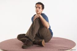 Casual Man White Sitting poses - simple Slim Short Brown Sitting poses - ALL Academic