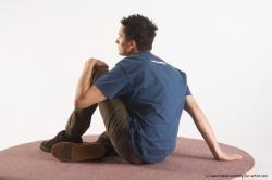 Casual Man White Sitting poses - simple Slim Short Brown Sitting poses - ALL Academic