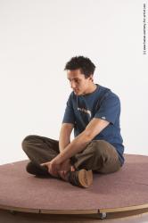 Casual Man White Sitting poses - simple Slim Short Brown Sitting poses - ALL Academic