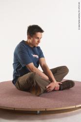 Casual Man White Sitting poses - simple Slim Short Brown Sitting poses - ALL Academic