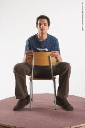 Casual Man White Sitting poses - simple Slim Short Brown Sitting poses - ALL Academic