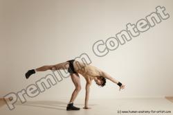 Underwear Gymnastic poses Man White Athletic Short Black Dancing Dynamic poses Academic