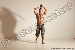 Fighting with sword Man White Moving poses Muscular Short Brown Dynamic poses Academic