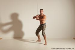 Fighting with sword Man White Moving poses Muscular Short Brown Dynamic poses Academic